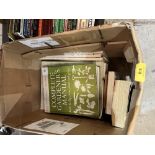 A box of gardening books