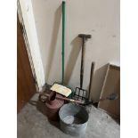 A watering can; galvanised bucket; a lawn scarifyer etc.
