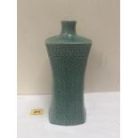 An oriental celadon glazed vase. 9' high