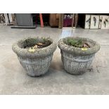 A pair of reconstituted garden pots. 12' high