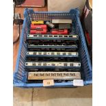 A box of model railway coaches etc.