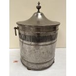A Regency steel coal bucket, the domed cover with finial. 19' high