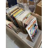 Two boxes of comics and annuals