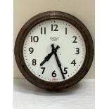 A Smiths 'Sectric' wall clock with electric movement and metal case. 24' diam
