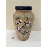 A Czechoslovakian Ampora vase with modernist decoration on a mottled ground. 13¾' high