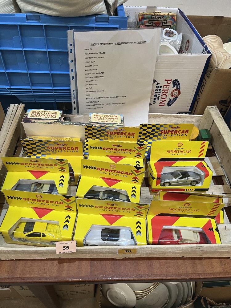 12 boxed Maisto (Shell) sports, supercars etc.