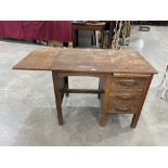 A 1930s oak dropleaf office desk. 36' wide