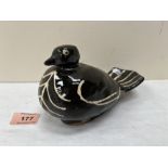 A Treacle glazed slip decorated bird moneybox. 7' long