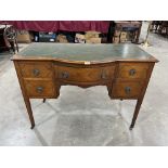 An early 20th century mahogany line inlaid bow-breakfront writing table, the green leather inlet top