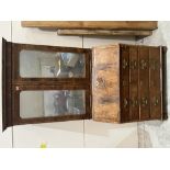 An 18th century walnut bureau bookcase, enclosed by a pair of mirrored doors over a pair of candle