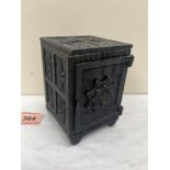 A miniature cast iron safety deposit box moneybank. 4¼' high