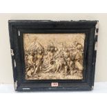 A 19th century continental composition plaque, battle scene in high relief. 10' x 13'