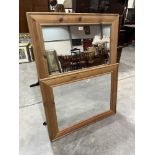 Two pine framed mirrors, the larger 47' x 34'