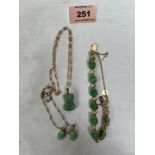 An Australian frog carved jade bracelet, pendant and earring drops en-suite, the necklet chain