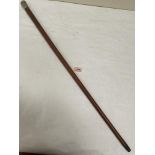 A Victorian malacca walking cane by Brigg, the silver pommel hallmarked London 1886. 36' long