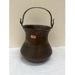 A middle eastern copper vessel with engraved decoration. 11½' high