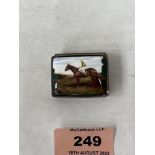 A silver and enamel snuffbox, the lid painted with a horse and jockey in a landscape. London 1956.