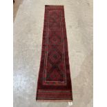 A Meshwani carpet runner. 2.46m x 0.54m