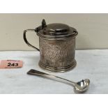 A Victorian silver mustard pot with engraved scroll and foliate decoration, blue glass liner, London