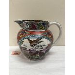 A 19th century Pratt style creamware jug, decorated in reserves with birds in a landscape or a