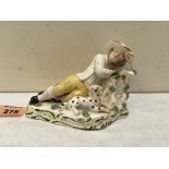 A 19th century Staffordshire group of sleeping boy rustic with dalmation hound. 5¼' wide