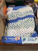 A crochet blanket. 74' x 52'