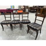 A set of four Regency style mahogany chairs with key pattern moulded tablet backs and ebonised