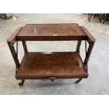 A 1930s walnut matamorphic 'Adap-Table' tea trolley