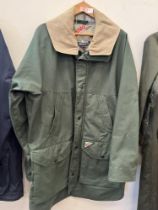 A Musto Goretex shooting coat. Size 42