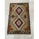 A Maimana Kilim rug. 0.95m x 0.61m