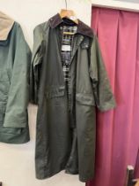 A Barbour Burghley coat. Size 34