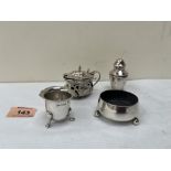 Two silver salts; a silver pepperette and a silver mustard pot with blue glass liner by Walker and