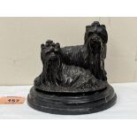 A French bronze group of two Yorkshire terriers, raised on a marble base. Indistinctly signed. 4¾'