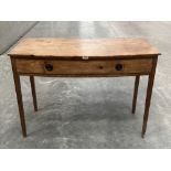 A George III pine bowfronted side table with frieze drawer, raised on square tapered legs. 42' wide