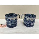 A pair of early 19th century pearlware coffee cans, blue and white transfer printed with deer in a