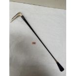 A Swaine riding crop with silver collar and antler handle. 27' long