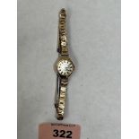 An F.Hinds 9ct cased lady's wristwatch on plated bracelet