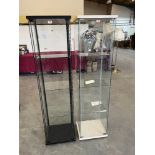 Two display cases. 64½' high