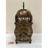 A brass lantern clock with Smiths movement. 9¾' high