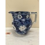 A Victorian pitcher, transfer decorated in blue and white with flowers and trailed foliage. 6½'