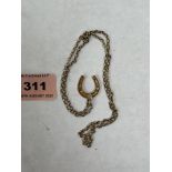 A 9ct horseshoe pendant on 9ct necklet chain. 8g