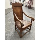 A 17th century joined elm wainscote chair