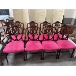 A set of eight Hepplewhite style mahogany dining chairs