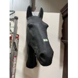 A fibreglass horses head on wall hanging mount. 35' high