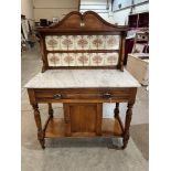 A late Victorian satinwood washstand with marble top and tiled splashback. 36' wide