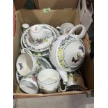A box of Royal Worcester Herbs pattern teaware