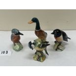 Four small Beswick birds, the duck 4¼' high