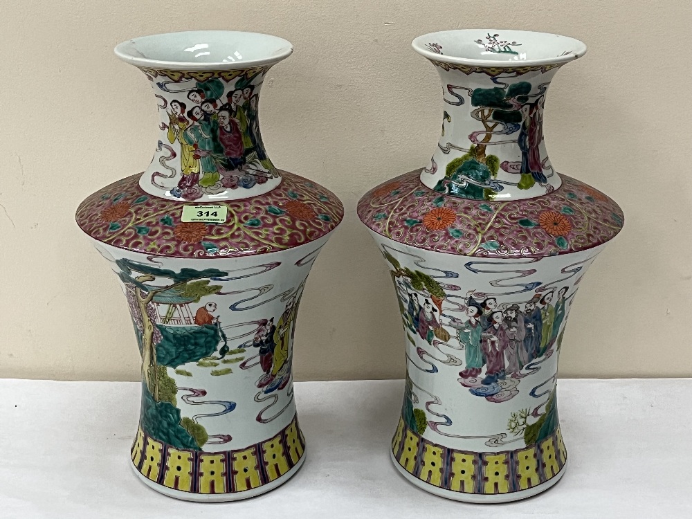 A pair of Chinese famille-rose vases, with continuous decoration of sages and officials in a