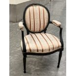 A 19th century ebonised and parcel gilt fauteuil armchair