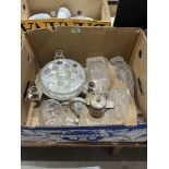 A box of glassware including a plated table centrepiece and claret jug